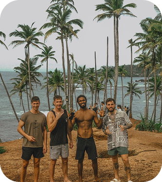 Tailslide boutique surf house madiha sri lanka_group of surfers standing with surf coach at coconut tree hill mirissa_surf lifestyle community accommodation _SurfHouse