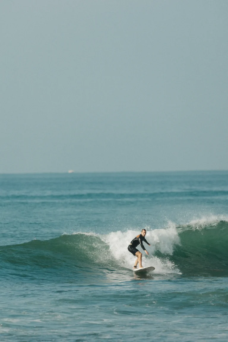 Surfer in Madiha Beach